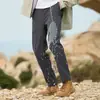 Calças de trilha softshell masculinas para atividades ao ar livre, calças compridas quentes com forro de fleece para outono e inverno, calças de montanhismo esportivas de trilha à prova de vento e resistentes ao desgaste femininas
