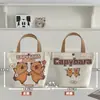 Nueva Bolsa de Lona Estilo Dibujo Animado Linda Gatito Bolso de Mano para Estudiante Versátil de Verano Ropa de Trabajo Bolsa de Gran Capacidad