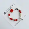 Pulsera de Cerámica Jingdezhen Nueva Historieta China Pulsera Boutique Venta al por Mayor Estudiante Joker Explosiones Puesto del Mercado Nocturno Pulsera