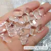 Atacado pela parte inferior da joia de unha cor de gelo branco diamante nu gelo através da pedra de açúcar coração torto transparente fundo pontudo unha de diamante decoração de diamante grande