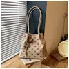 Bolso tote de lunares transfronterizo de lujo ligero 2026 nuevo bolso de hombro de moda nicho de gran capacidad bolso de mano para el día a día