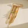 Broche de Clip de Papel con Borla de Cadena Transfronteriza Europeo y Americano, Pin de Diseño de Moda Personalizado, Accesorio de Pecho de Lujo Ligero de Nicho de Gama Alta