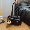 Bolsa de Bolos Retro para Mujer 2026 Otoño/Invierno Nuevo Bolso de Mano de Charol Bolso de Hombro Único Cruzado Bolsa de Moda Trendy para el Trabajo