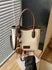 Bolso de hombro de moda transfronterizo para mujer, elegante diseño de bloques de color, bolso tote simple y versátil para el trabajo, retro y casual