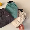 Pantalones Largos para Niños 2026 Nueva Colección de Primavera Niños y Niñas Pantalones con Cordón de Bloques de Color Pantalones para Bebé con Cinturón de Letras