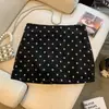 Tiro real: Elegante saia de camurça com poá para mulheres, nova saia curta slim fit de outono que abraça o quadril, saia curta evasê que rejuvenesce para mulheres