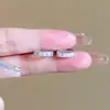 Brincos de tarraxa de círculo de cristal, brincos únicos com um design de nicho, brincos de alta qualidade para mulheres, brincos de zircônia