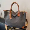 Bolsa Tote Grande Capacidade Retrô Feminina 2025 Nova Bolsa Transversal de Verão Tendência da Moda Textura Casual Bolsa de Ombro
