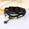 Popular Europeo y Americano Nuevo Colgante de Torre de Hierro Tejido Pulsera de Cuero Correa de Reloj Accesorios para Estudiantes Pulsera de Cuero Genuino