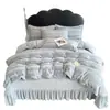 Juego de ropa de cama de cuatro piezas estilo lujo con pelo de conejo y terciopelo de leche, con un diseño de alta gama, engrosado para abrigar y adecuado para uso invernal