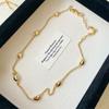 Collar de tira de cuentas irregulares rojas de Ankara para mujer, cadena de lana de alta gama, combinable con todo.