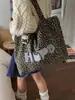 Bolsa de Hombro Casual de Gran Capacidad para el Otoño 2026 Transfronteriza Estampado de Leopardo de Nicho Versátil Retro Bolso de Mano Tote para el Trabajo