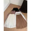 Novedades de Ruo Xin para Primavera/Otoño 2026: conjunto de dos piezas: top de punto de manga larga con cuello redondo y falda midi plisada