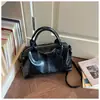 Bolso Boston grande de gran capacidad retro transfronterizo para mujer, nuevo modelo de moda principios de primavera 2026, bolso de hombro para el trabajo