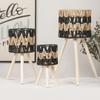 Rack para macetas de mimbre sintético simple, adornos decorativos creativos para el hogar, estante decorativo para macetas de interior de madera maciza, suministro transfronterizo