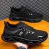 Comercio exterior al por mayor primavera y otoño nuevo transpirables malla flyknit moda versátiles zapatillas para correr casuales deportes al aire libre zapatos de hombre