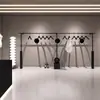 Estante de Exhibición para Tienda de Ropa de Hierro Minimalista Negro Montado en Pared Perchero de Ropa para Tienda de Ropa de Mujer Estante de Ropa de Pared Modelo Nuevo