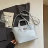 Bolsa pequena de alta qualidade para mulheres, nova 2026 elegante versátil transversal casual popular item quente bolsa de mão para o dia a dia bolsa tipo balde