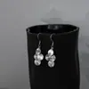 Aretes Florales de Lentejuelas Estilo Francés para Mujer, Diseño de Nicho, Lujo Ligero, Sensación de Alta Gama, Aretes Dinámicos Retro