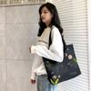 Bolsa de Lona Feminina Original 2025 Nova Bolsa de Mão Estudante Casual Bolsa de Ombro Bolsa de Nicho Dropshipping Atacado