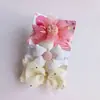 AliExpress nova faixa de cabelo infantil europeia e americana 3 peças bebê alargado faixa de cabeça de nylon cocar acessórios para cabelo de menina lote de comércio exterior