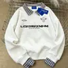Diseño Único Versátil Estampado de Letras Sudadera Retro de Dos Piezas Falsas para Mujer Otoño e Invierno 2025 Top Holgado Adelgazante