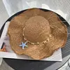 En stock nuevo sombrero de paja Lafite sombrero tejido a mano para mujer salida de verano vacaciones versátil ala ancha protección solar sombrero de playa