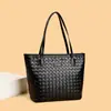 Bolsa de mano tejida transfronteriza de gran capacidad para mujer, nuevo bolso de hombro/axila casual versátil para el verano 2026