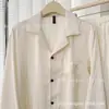 26 Pijama de Seda Helada para Pareja de Hilo Dorado y Plateado de Venta Caliente en Primavera Rayado Color Sólido Conjunto de Pijama Fresco de Alta Gama para Pareja