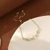 Pulseira de trevo de quatro folhas em cobre com zircônia cravejada super brilhante pulseira colar brincos de tarraxa moda feminina pulseira joias versáteis fábrica de joias
