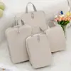 Set de cinco piezas de almacenamiento para viajes multiestilo, bolsa de almacenamiento portátil de tela Oxford con patrón de diamante impermeable