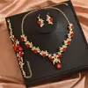 Vestido de Noiva Vestido de Festa Colar Brincos Pulseira Conjunto de Três Peças Acessórios Corrente para Clavícula Conjunto de Joias Femininas Atacado
