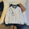 Camisa de polo tipo patchwork a cuadros de dos piezas falsas para hombre, primavera y otoño, de alta gama, elegante, camiseta casual de manga larga, sudadera de hombro regular