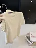 Suéter de ganchillo hueco de manga corta con cuello redondo para mujer, estilo suave de principios de otoño, top de punto que reduce la edad