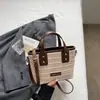 Bolsa Nova Tendência Primavera 2026 para Mulheres Estilo Coreano Bolsa Tote Simples Trançada Moda Retro Bolsa de Ombro de Axila