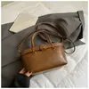 Bolsa de Mão Feminina Estilo Retrô de Nicho Coreana Nova Moda Outono e Inverno 2025 Bolsa de Ombro Único Transversal Bolsa de Trabalho de Alta Qualidade