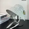 Sombrero de Pescador Rayado Estilo Coreano para Mujer, Nuevo Modelo Verano 2026, Ala Ancha, Protección Solar para Exteriores, Diseño Fresco y Sencillo, Sombrero de Sol de Ala Pequeña