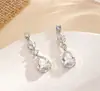 Pendientes de Gota de Agua con Forma de Pera de Venta Caliente Transfronterizos, Versátiles, Simples, Elegantes, Modernos, Banquete de Boda, Estilo de Lujo Ligero, Pendientes de Pétalo