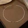 Colar de pérolas de vidro douradas e prateadas com microesferas para mulheres, elegante e moderno, corrente ultrafina para clavícula com pequenas pérolas de imitação
