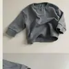 Camiseta de manga larga tipo suéter para primavera y otoño para niños, nueva camiseta casual versátil para niños, niños y niñas, top de cuello redondo para niñas