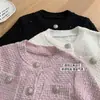 Cardigan de punto de alta calidad con hombrera de oveja lechosa