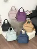 Venta al por mayor de bolsos nuevos para mujer, tendencia transfronteriza, bolso de mano, bolso de hombro, bolso cruzado, mochila multipropósito, mochila casual de moda con múltiples compartimentos