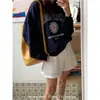 Moletom de Gola Redonda Dongdaemun da Coreia do Sul Feminino Inverno Novo Estilo Atmosférico Usar Personalizado Estampado Manga Longa Solto Top para Mulheres