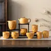 Seção Dourada Argila Roxa Bule de Chá Artesanal Relevo Minério Bruto Conjunto de Chá Kung Fu Caneca de Chá Dragão e Fênix de Alta Qualidade Bule Venda por Atacado