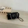 Bolso de mano de moda estilo coreano 2026 verano nuevo bolso tote pequeño de cadena con patrón de diamantes, bolso tipo almohada de un solo hombro cruzado de alta apariencia