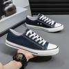 Zapatos de lona 2025 para hombre casual amantes zapatos de hombre coreanos de caña baja zapatos de pizarra pequeños clásico al por mayor zapatos vulcanizados