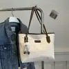 Bolso Tote para Mujer 2025 Nuevo Bolso Commuter de Gran Capacidad Primavera y Verano Bolso de Hombro Versátil Bolso de Moda para Estudiante Universitario