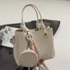 Bolso Cubo Sencillo de Mano 2026 Primavera Nuevo Estilo Coreano Moda Gran Capacidad Texturizado Colgante Hombro Cruzado