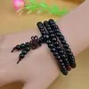 Pulsera al por mayor de 108 cuentas de sándalo negro imitación con nudo, cuentas de Buda, pulsera de cuentas de madera con nudo, pulsera de madera