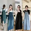 Foto Real de Falda con Tirantes de Mezclilla, Vestido de Largo Medio Adelgazante para Mujer, Estilo Casual Holgado Versátil en Negro, Azul Claro y Azul Oscuro